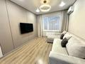 2-комнатная квартира · 48 м² · 10/12 этаж, Райымбека 210/3 за 51 млн ₸ в Алматы, Алмалинский р-н — фото 11