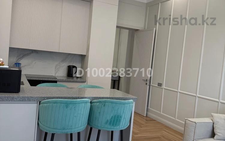 2-комнатная квартира · 51 м² · 12/12 этаж, Сатпаева 30 за 550 000 〒 в Алматы, Бостандыкский р-н — фото 2