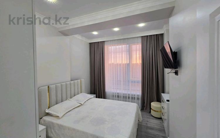 2-комнатная квартира · 56 м² · 7/25 этаж, Байдибек би стр. 127/7 за 230 000 〒 в Шымкенте, Абайский р-н — фото 2