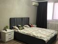 2-комнатная квартира · 59 м² · 5/9 этаж, 4-й мик 11 — Торговый центр за 17 000 〒 в Аксае — фото 7