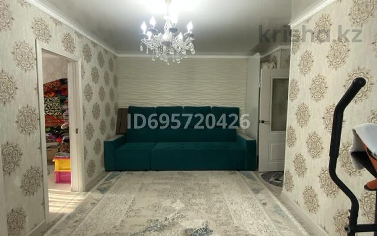 4-комнатная квартира · 63 м² · 3/5 этаж, 1 мик — 1 мик, 22 дом за 15 млн 〒 в Жанатасе — фото 2