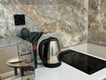 1-бөлмелі пәтер · 40 м² · 9/14 қабат, Толе би 24, бағасы: 17 000 ₸ в Астане, Нура р-н — фото 12