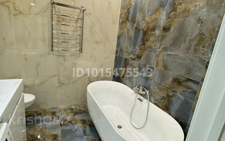 2-комнатная квартира · 70 м² · 13/14 этаж, Кабанбай батыр 56а за 70 млн ₸ в Астане, Есильский р-н — фото 2
