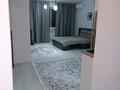 1-комнатная квартира · 50 м² · 9/10 этаж, мкр Аксай-5, Б. Момышулы 25 за 15 000 ₸ в Алматы, Ауэзовский р-н — фото 3