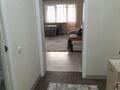 1-комнатная квартира · 50 м² · 9/10 этаж, мкр Аксай-5, Б. Момышулы 25 за 15 000 ₸ в Алматы, Ауэзовский р-н — фото 13