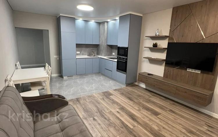 2-комнатная квартира · 82 м² · 4/12 этаж, Навои 9/1 за 430 000 ₸ в Алматы, Ауэзовский р-н — фото 2