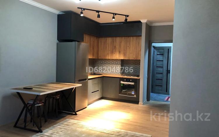 2-комнатная квартира · 54 м² · 13/13 этаж, Толе би — Жарокова за 350 000 ₸ в Алматы, Алмалинский р-н — фото 3
