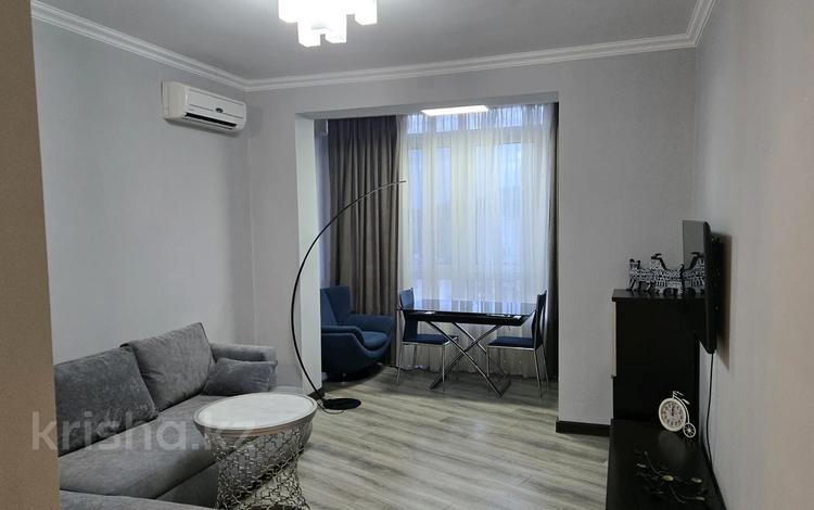 2-комнатная квартира · 56 м² · 9/15 этаж, Богенбай батыра 79 за 400 000 ₸ в Алматы, Медеуский р-н — фото 2