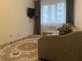 2-комнатная квартира, 55 м², 4/12 этаж посуточно, мкр Акбулак за 12 000 〒 в Алматы, Алатауский р-н — фото 4
