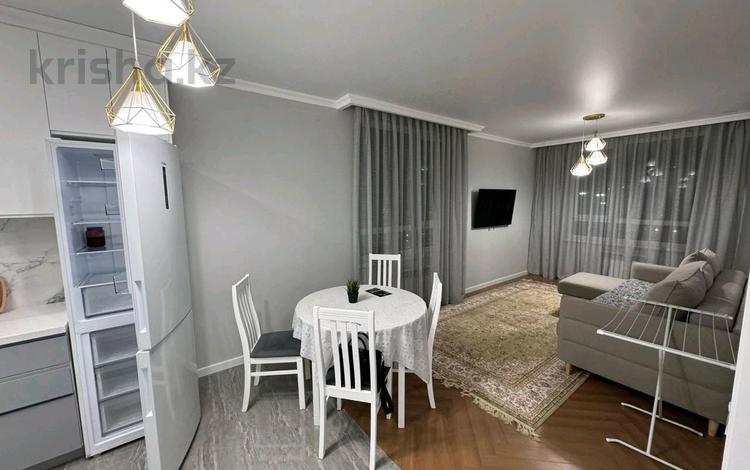 2-комнатная квартира · 57 м² · 13/14 этаж, Утепова 31 за 48.5 млн ₸ в Алматы, Бостандыкский р-н — фото 2