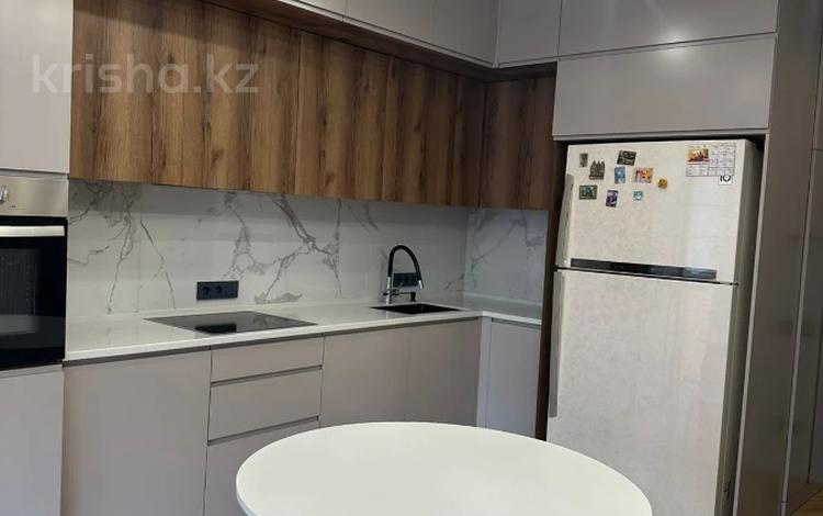 2-комнатная квартира · 74 м² · 16/21 этаж, Варламова за 56.9 млн 〒 в Алматы, Алмалинский р-н — фото 2
