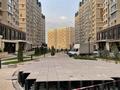2-комнатная квартира, 57 м², 10/18 этаж, Жандосова 94А за 39 млн 〒 в Алматы, Бостандыкский р-н — фото 4