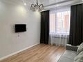 2-комнатная квартира · 60 м² · 3/8 этаж, Кабанбай Батыра 58Б за 48.6 млн ₸ в Астане, Есильский р-н — фото 4