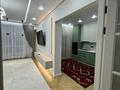 2-комнатная квартира · 77 м² · 11/12 этаж, мкр Нурсая, Маденова 1В за 450 000 ₸ в Атырау — фото 15