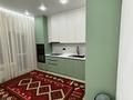 2-комнатная квартира · 77 м² · 11/12 этаж, мкр Нурсая, Маденова 1В за 450 000 ₸ в Атырау — фото 16
