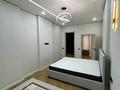 2-комнатная квартира · 77 м² · 11/12 этаж, мкр Нурсая, Маденова 1В за 450 000 ₸ в Атырау — фото 26