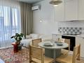 2-комнатная квартира · 52 м² · 18/18 этаж, Сыганак 28 за 400 000 ₸ в Астане, Нура р-н — фото 2