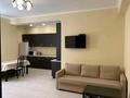 2-комнатная квартира · 55 м² · 11/15 этаж, Кабанбай батыра 46 за 20 000 ₸ в Астане, Есильский р-н — фото 2