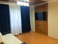 1-комнатная квартира, 33 м² посуточно, проспект Бухар Жырау 58 за 8 000 〒 в Караганде, Казыбек би р-н — фото 2
