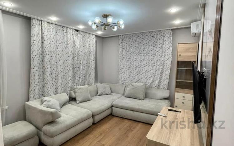 2-комнатная квартира · 42.5 м² · 8/12 этаж, Тургут Озала 194 за ~ 49.5 млн ₸ в Алматы, Бостандыкский р-н — фото 2