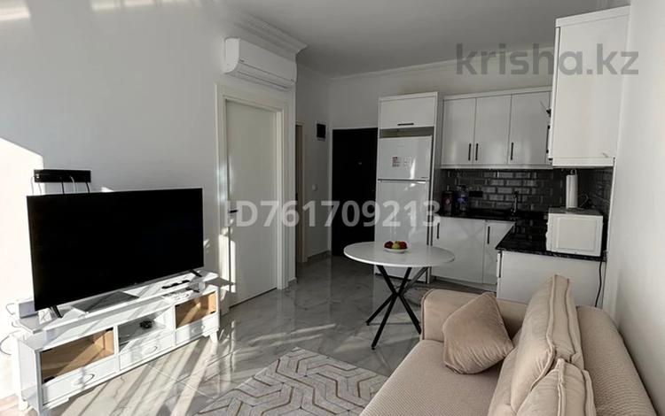 2-бөлмелі пәтер · 49 м² · 7/9 қабат, Aqua Residence, Avsalar 1 — Алания, район Авсалар, бағасы: 38 млн 〒 в Анталье — фото 2