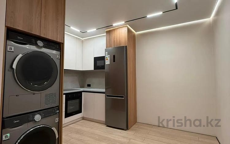 2-бөлмелі пәтер · 65.7 м² · 16/18 қабат, Утепова 31, бағасы: 46.5 млн ₸ в Алматы, Бостандыкский р-н — фото 2