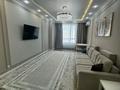 3-комнатная квартира · 102.4 м² · 9/14 этаж, Кабанбай батыра 56а за 90 млн ₸ в Астане, Есильский р-н — фото 3