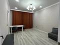 2-комнатная квартира · 45 м² · 1/9 этаж, мкр Аккент 36 за 280 000 ₸ в Алматы, Алатауский р-н — фото 10