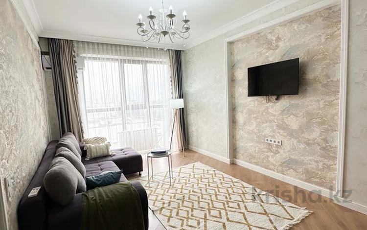 2-комнатная квартира · 54 м² · 11/12 этаж, Торайгырова 21/1 — Мустафина за 42 млн 〒 в Алматы, Бостандыкский р-н — фото 2