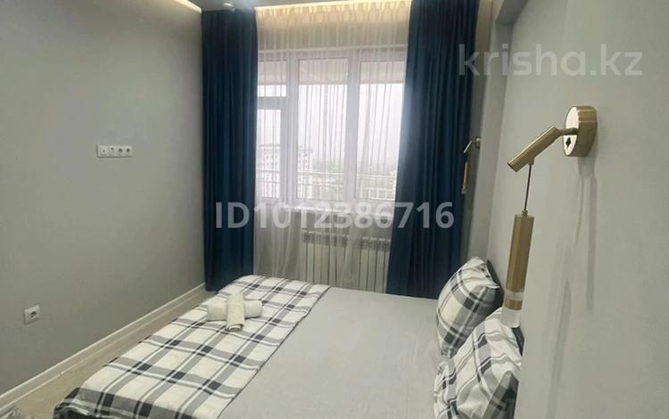 2-комнатная квартира · 55 м² · 11/12 этаж, ул. Торайгырова 21/1 за 22 000 ₸ в Алматы, Бостандыкский р-н — фото 2