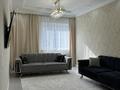 3-комнатная квартира · 103 м² · 4/19 этаж, Кабанбай батыра 29 за 57 млн ₸ в Астане, Нура р-н — фото 2