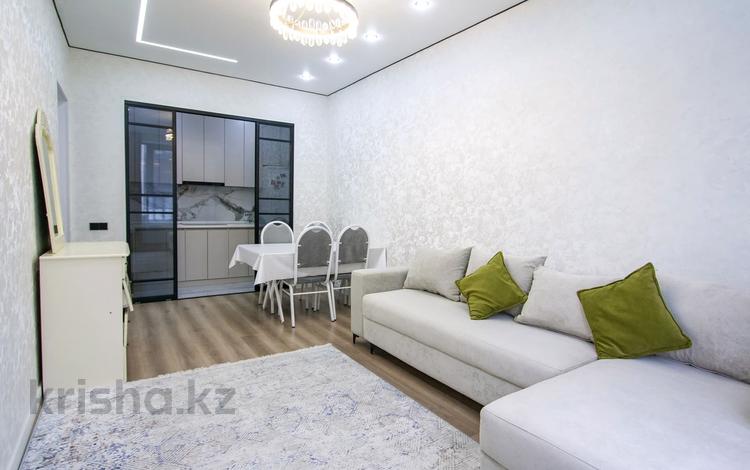 2-комнатная квартира · 43 м² · 14/20 этаж, Тургут Озала 237 за 47 млн ₸ в Алматы, Бостандыкский р-н — фото 2