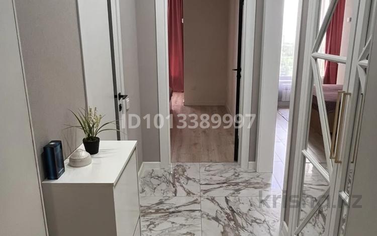 2-комнатная квартира · 40 м² · 9/12 этаж, Кабанбай батыра 59Б за 240 000 ₸ в Астане, Нура р-н — фото 2