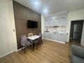 2-комнатная квартира · 42 м² · 7/13 этаж, Кабанбай батыра за 350 000 ₸ в Алматы, Алмалинский р-н — фото 2