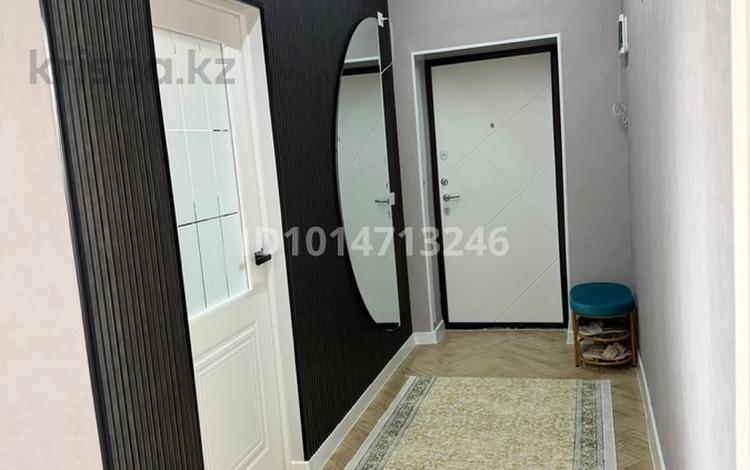 2-комнатная квартира · 69 м² · 5/6 этаж, Торегали Кадыров 55а — 7 мкр 3 дом за 25 млн ₸ в Жанаозен — фото 2