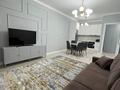 2-комнатная квартира · 55 м² · 9/14 этаж, Кабанбай батыра 56б за 350 000 ₸ в Астане, Есильский р-н — фото 2
