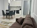 2-комнатная квартира · 55 м² · 9/14 этаж, Кабанбай батыра 56б за 350 000 ₸ в Астане, Есильский р-н — фото 3