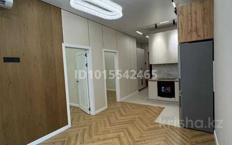 2-бөлмелі пәтер · 50 м² · 3/12 қабат, Момышулы 100, бағасы: 33 млн ₸ в Алматы, Алатауский р-н — фото 9