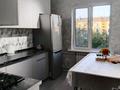 3-бөлмелі пәтер · 68 м² · 4/5 қабат, 1мкр 38а, бағасы: 31.5 млн ₸ в Конаеве — фото 11