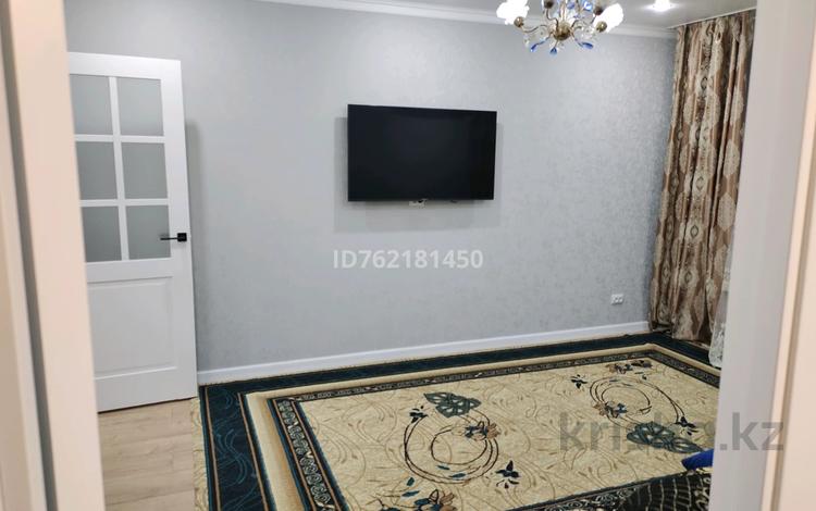 2-комнатная квартира · 52 м² · 2/5 этаж, 10 микрорайон за 170 000 〒 в Аксае — фото 2