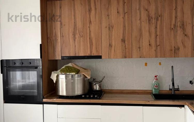2-комнатная квартира · 74 м² · 4/10 этаж, мкр Нурсая, Т. Жумагалиева 10 за 30 млн ₸ в Атырау — фото 2