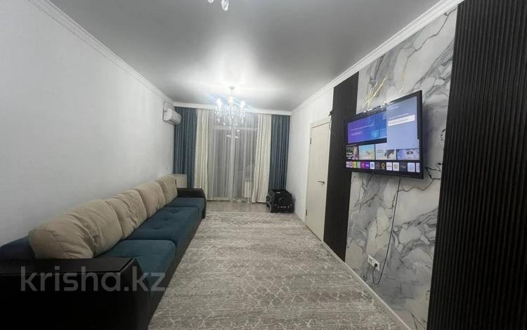 3-комнатная квартира · 71 м² · 12/12 этаж, Кошкарбаева за 41 млн 〒 в  — фото 4