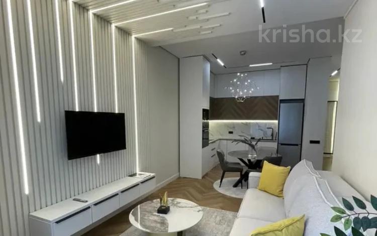 2-комнатная квартира · 55 м² · 7/9 этаж, Навои 58/4 за 350 000 ₸ в Алматы, Ауэзовский р-н — фото 2