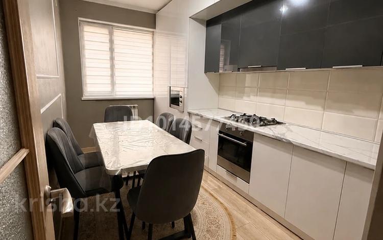 2-комнатная квартира · 62 м² · 6/7 этаж, мкр Акжайык, Толеметова 69/43 за 220 000 ₸ в Шымкенте, Абайский р-н — фото 2