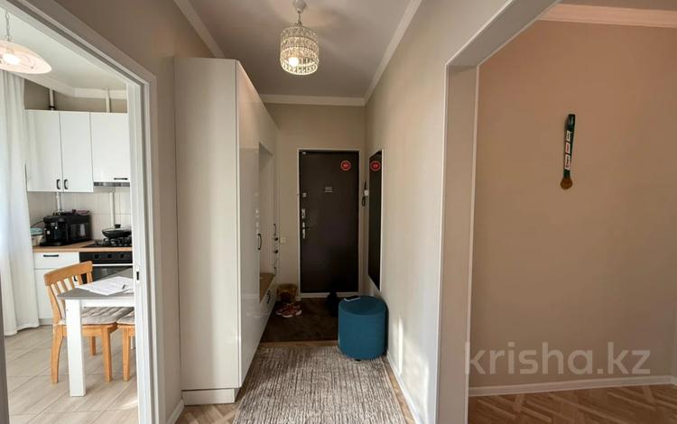 2-комнатная квартира · 57 м² · 7/9 этаж, мкр Аксай-5 — Б.Момышулы-Жубанова за 45.5 млн ₸ в Алматы, Ауэзовский р-н — фото 9