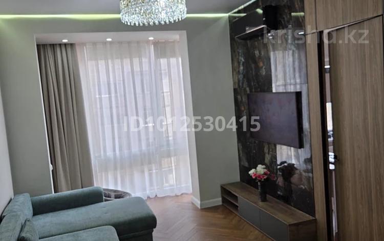 2-комнатная квартира · 50 м² · 7/20 этаж, Микрорайон Мамыр-1 за 48 млн ₸ в Алматы, Ауэзовский р-н — фото 2