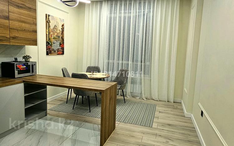 2-комнатная квартира · 69 м² · 9/12 этаж, Торекулова 95 за 425 000 ₸ в Алматы, Алмалинский р-н — фото 2