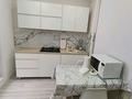 2-комнатная квартира · 52 м² · 7/9 этаж, 5 микр 12 за 22 млн ₸ в Аксае — фото 5