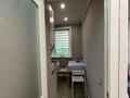2-бөлмелі пәтер · 45 м² · 4/5 қабат, Жаңа қала ш/а., Ержанова, бағасы: 17.8 млн ₸ в Караганде, Казыбек би р-н — фото 3