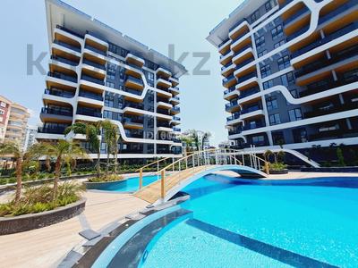 3-комнатная квартира · 100 м² · 4/9 этаж, Tosmur — Tosmur отель Diamond Hill Resort за 210 млн 〒 в Аланье